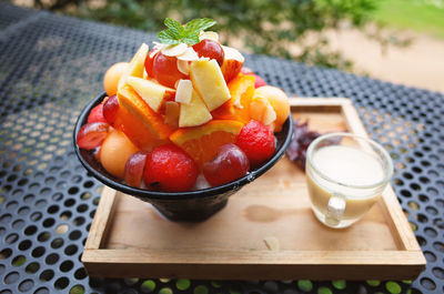 High angle view of fruits in glass on table