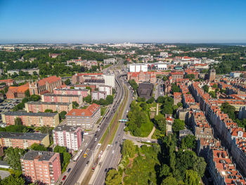 High angle view of road amidst buildings in city