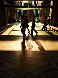 High angle view of man walking on street