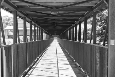 Metallic footbridge in city