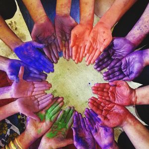 Close-up of multi colored hands