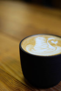 High angle view of cappuccino on table