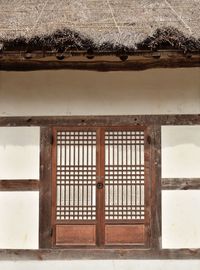 Close-up of roof against window