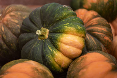 Background of some big orange green pumpkins