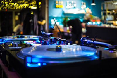 View of illuminated lighting equipment at night