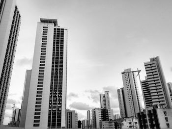 Low angle view of skyscrapers against sky