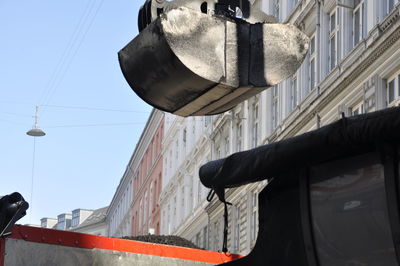 Low angle view of buildings against clear sky