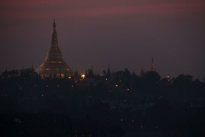 Panoramic view of illuminated buildings against sky