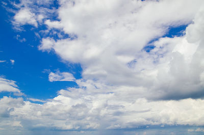 Low angle view of blue sky and clouds