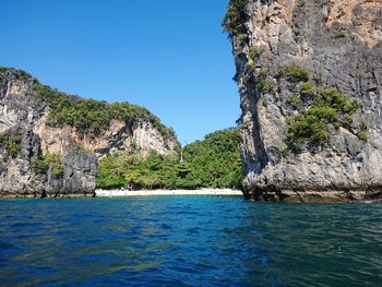 Scenic view of sea against clear blue sky