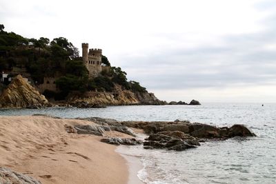 Scenic view of beach against sky