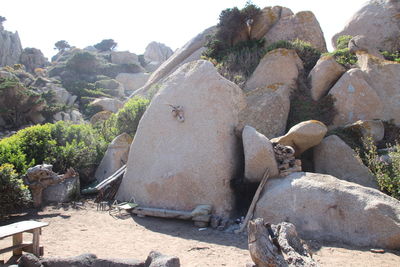 Rocks on mountain against sky