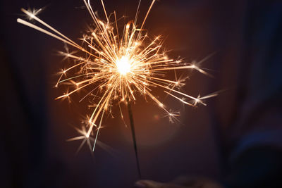 Close-up of firework display at night