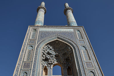 Low angle view of temple against building