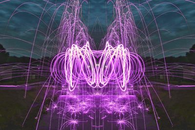 Light painting of firework display at night