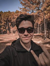 Portrait of young man wearing sunglasses