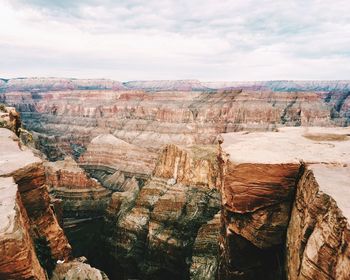 Scenic view of rock formations against sky