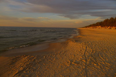 Scenic view of sea at sunset