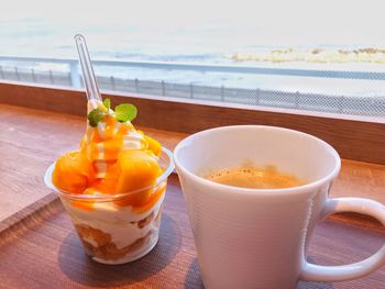 Close-up of coffee served on table