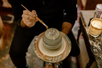 Artisan working with clay