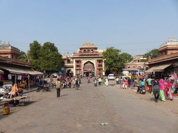 Group of people in front of historical building