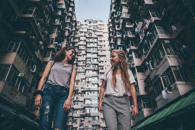 High angle view of woman standing on city