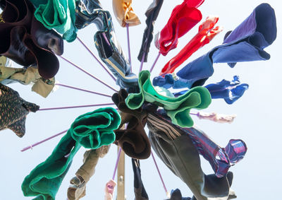 Low angle view of multi colored umbrellas