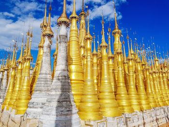 Low angle view of temple against blue sky