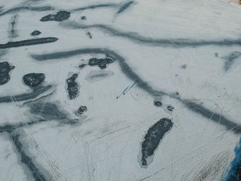 High angle view of footprints in snow