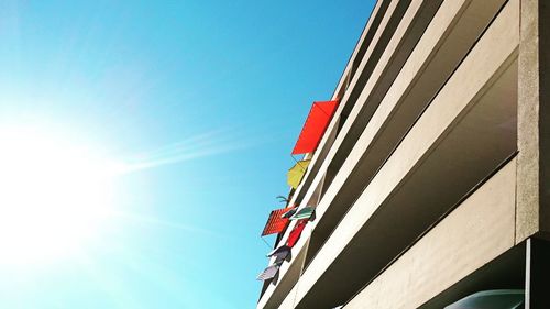 Low angle view of building against clear blue sky