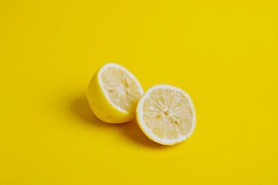 Close-up of fruit over white background