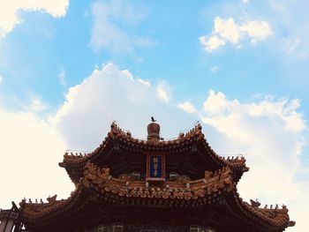 Low angle view of temple building against sky