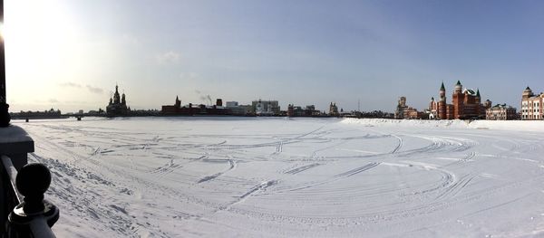 Panoramic view of city buildings during winter