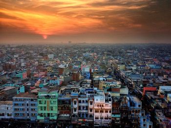 Aerial view of city at sunset