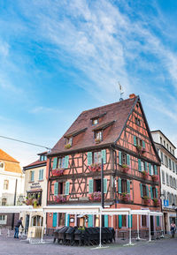 Low angle view of old building against sky