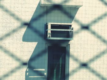 High angle view of fence on sunny day