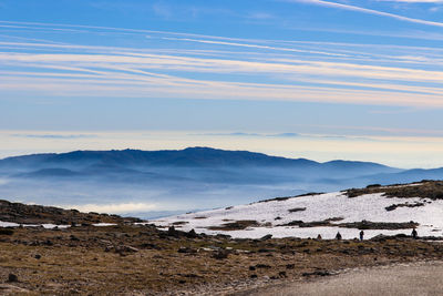 Scenic view of mountains against sky during winter