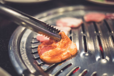 High angle view of meat in cooking pan