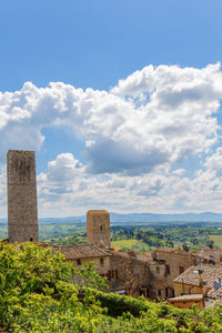 View of old building against cloudy sky