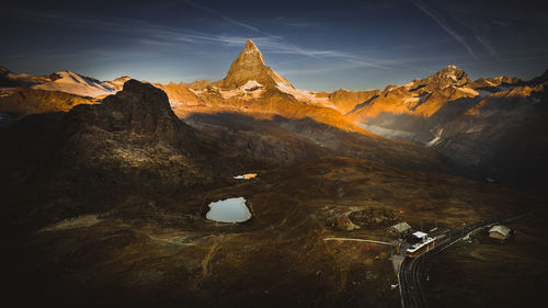 Scenic view of matterhorn against sky in the morning sun