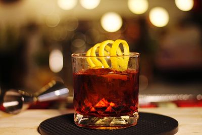 Close-up of whiskey in glass on table