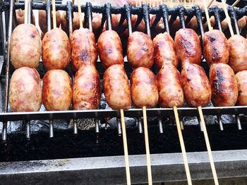 Close-up of meat on barbecue grill