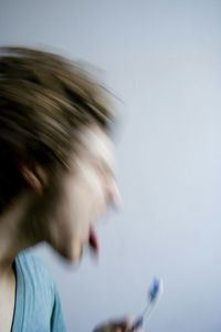 Cropped image of woman over white background