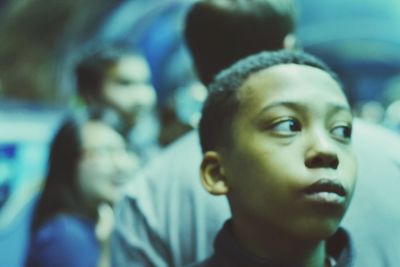 Close-up of boy looking away