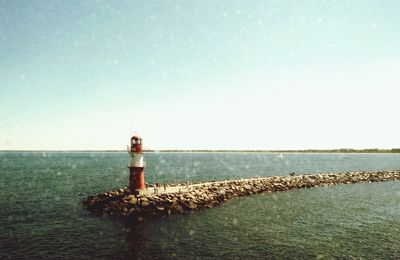 Scenic view of sea against clear sky