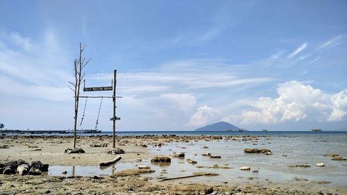 Scenic view of beach against sky