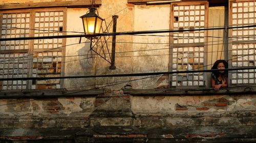 Reflection of man on window