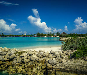 Scenic view of sea against cloudy sky