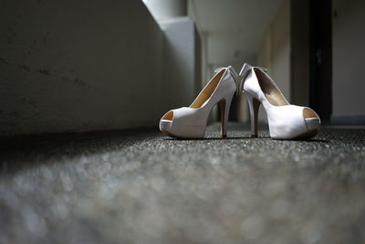 Close-up of shoes on table