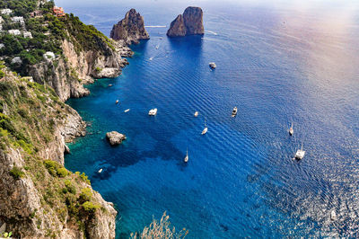 High angle view of boats on sea shore